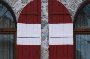 red and white wooden door